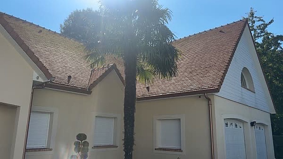 Maison avec toiture en tuiles rénovée