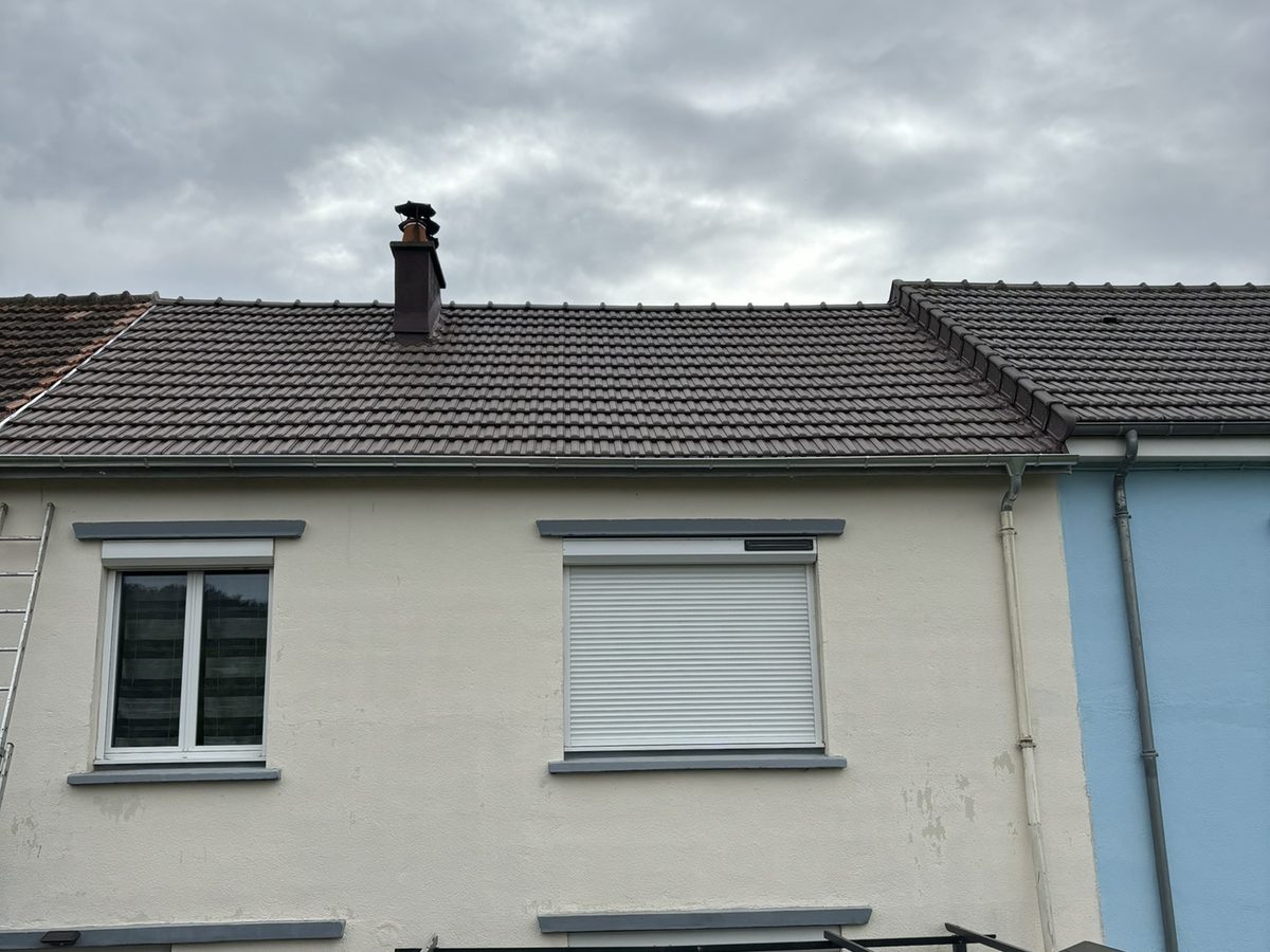 Maison avec toiture neuve en tuiles